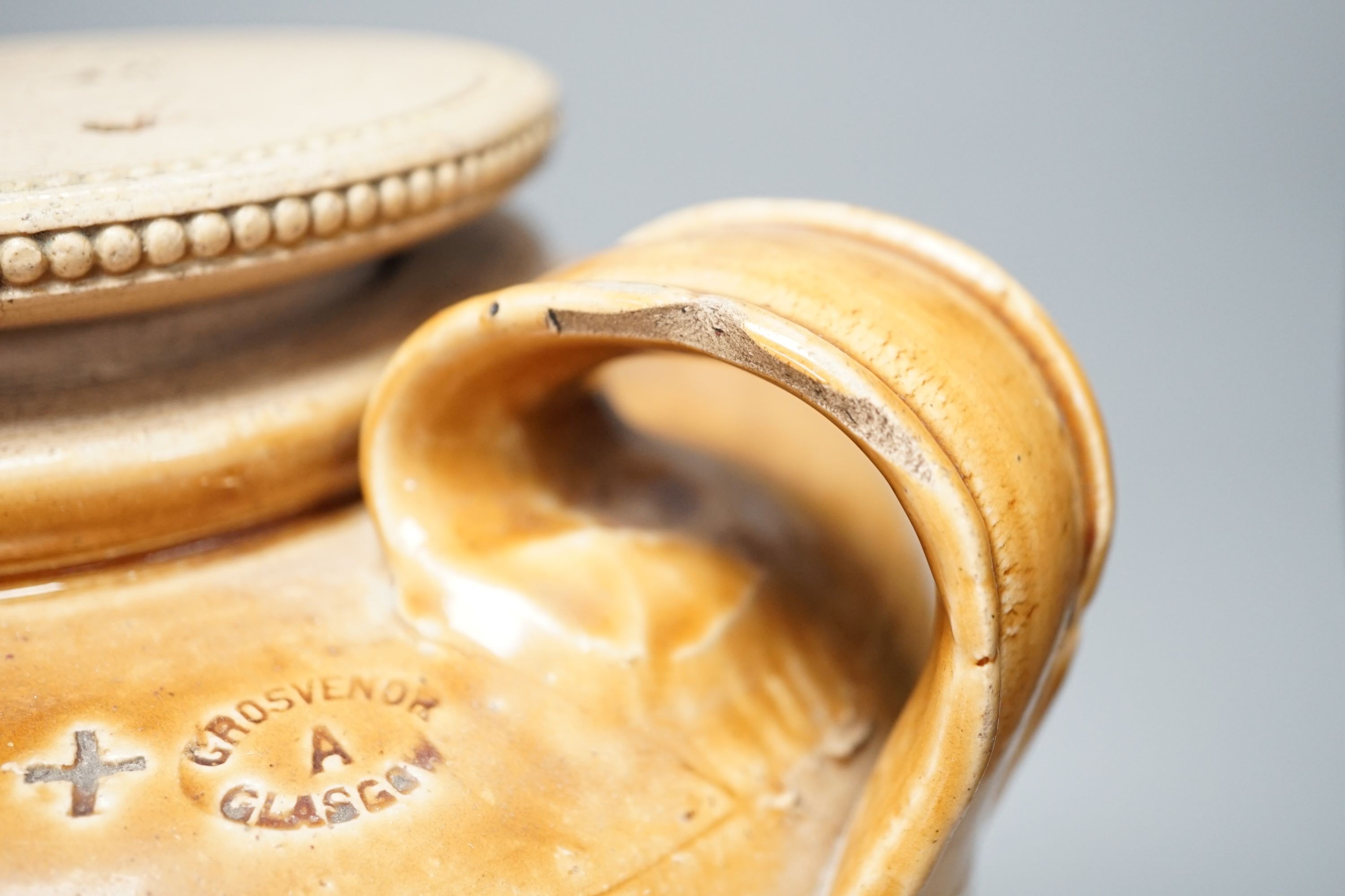 A Grosvenor Glasgow stoneware beer, storage jar, 37 cms high.